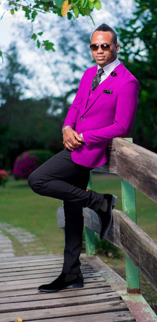 Marlon Samuels wearing a purple suit